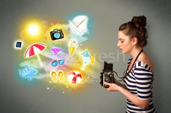 Teenage photographer making photos of holiday painted icons Stock photo © ra2studio