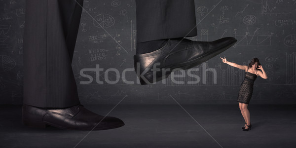 Hatalmas láb pici háttér öltöny fiatal Stock fotó © ra2studio
