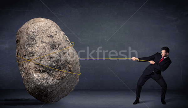 üzletember húz hatalmas kő kötél üzlet Stock fotó © ra2studio
