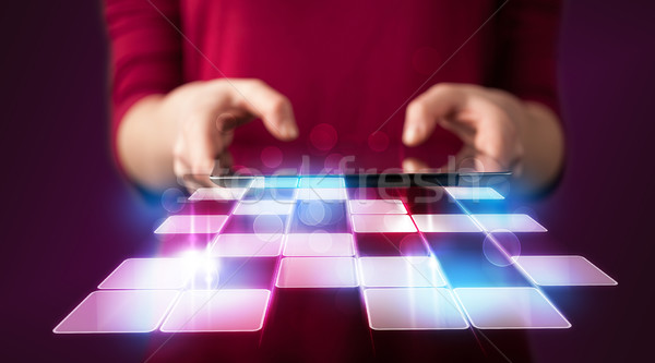 Close up of hand holding tablet with cyber application Stock photo © ra2studio