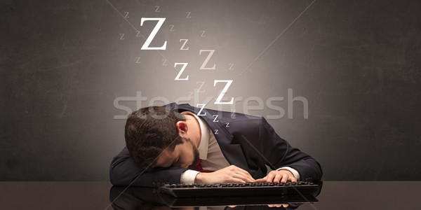 üzletember alszik iroda billentyűzet fiatal asztal Stock fotó © ra2studio
