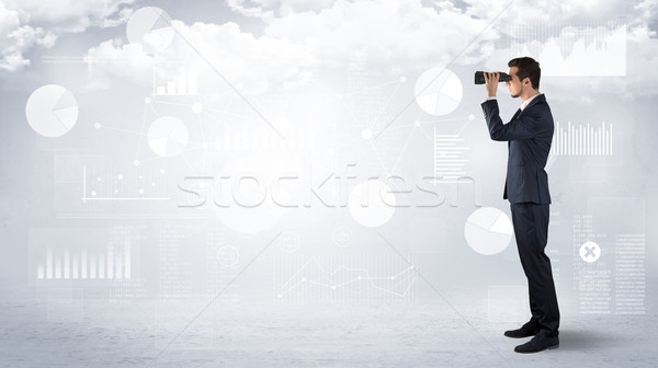 Businessman  looking forward with binoculars Stock photo © ra2studio
