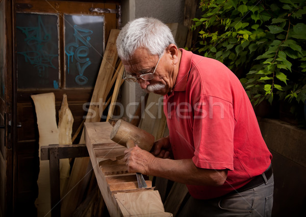 Velho trabalhando mão madeira construção indústria Foto stock © ra2studio