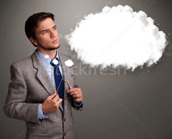 Stock photo: Good-looking young man thinking about cloud speech or thought bubble