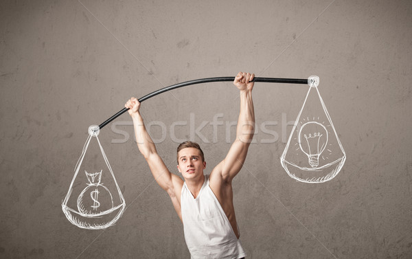 muscular man trying to get balanced  Stock photo © ra2studio