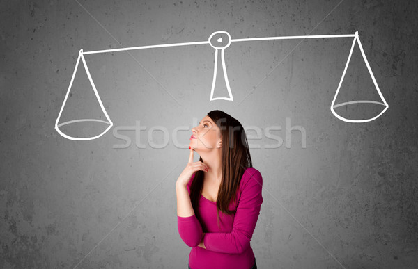 Young woman taking a decision Stock photo © ra2studio