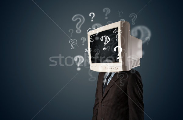 Om de afaceri monitor de calculator cap semne de intrebare afaceri faţă Imagine de stoc © ra2studio