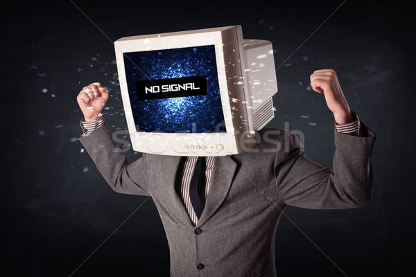 Man with a monitor head, no signal sign on the display Stock photo © ra2studio