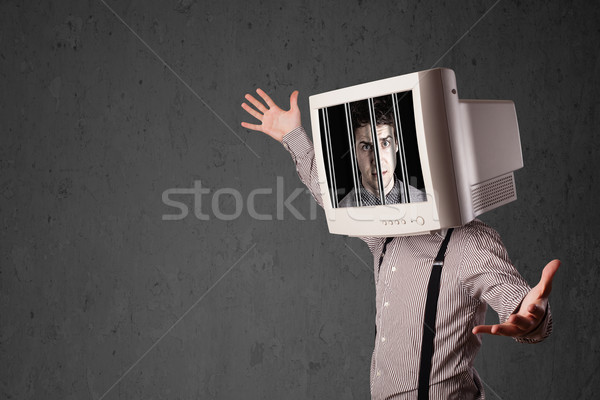 Business man with monitor on his head traped into a digital syst Stock photo © ra2studio