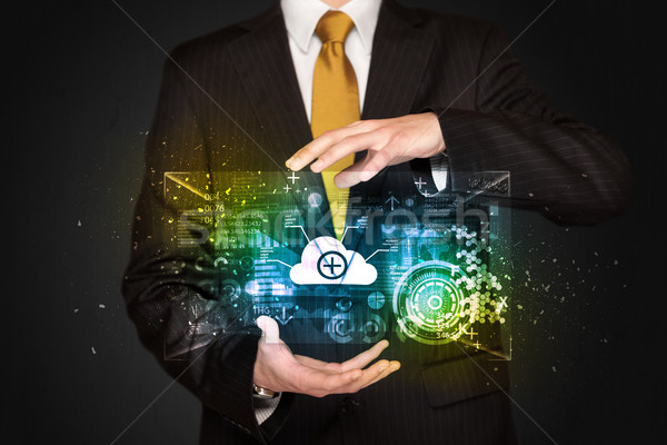 Businessman holding data cloud Stock photo © ra2studio