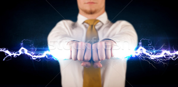 Foto stock: Hombre · de · negocios · electricidad · luz · manos