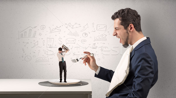 Big businessman eating small employee with doodled charts concept Stock photo © ra2studio