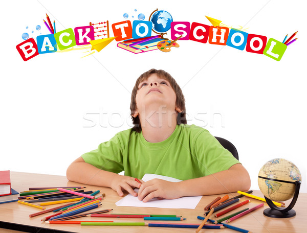 Boy with back to school theme isolated on white Stock photo © ra2studio