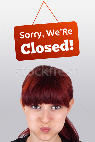 Young girl head looking at closed and open signs Stock photo © ra2studio