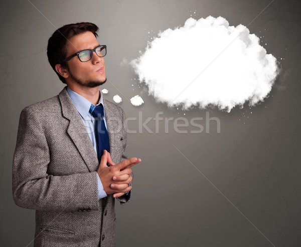 Good-looking young man thinking about cloud speech or thought bubble Stock photo © ra2studio