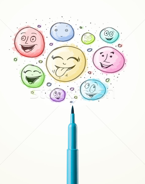 Smiley faces coming out of felt pen Stock photo © ra2studio