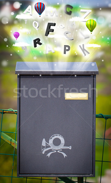 Post box with colorful letters Stock photo © ra2studio