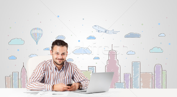 Attractive businessman with city sky-scape background Stock photo © ra2studio