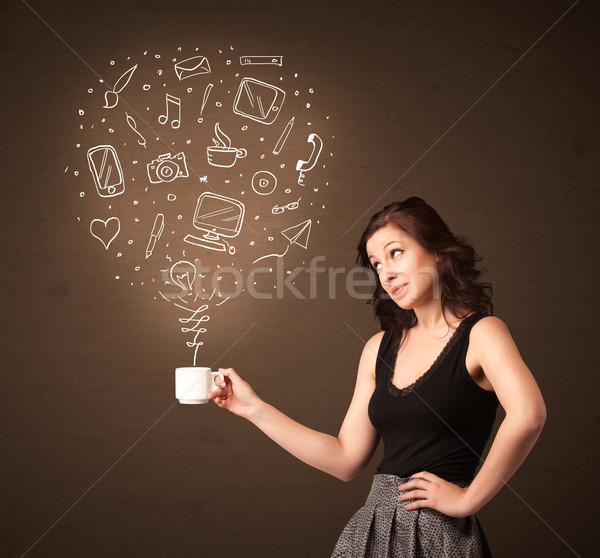 Businesswoman holding a white cup with social media icons Stock photo © ra2studio