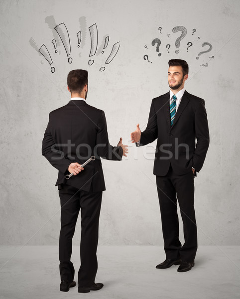 Ruthless business handshake Stock photo © ra2studio