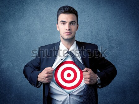 Businessman tearing shirt with target sign on his chest Stock photo © ra2studio