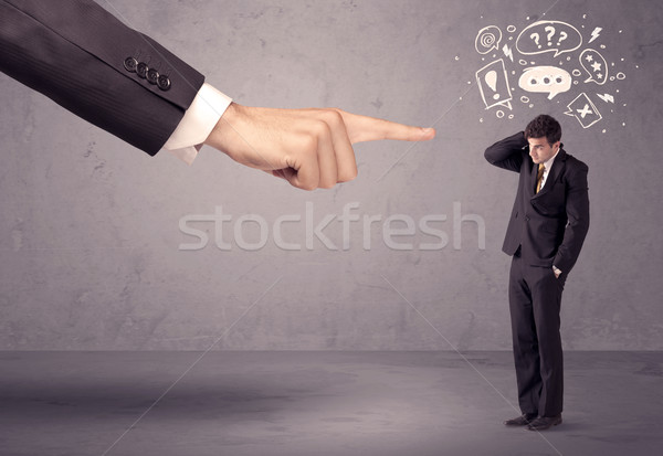 Stock photo: Boss hand pointing at confused employee