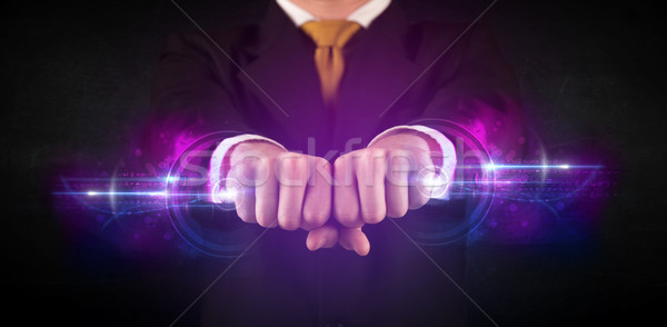 Stock photo: Business man holding future technology data system network 