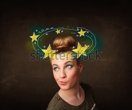 Stock photo: girl with yellow stars circleing around her head illustration