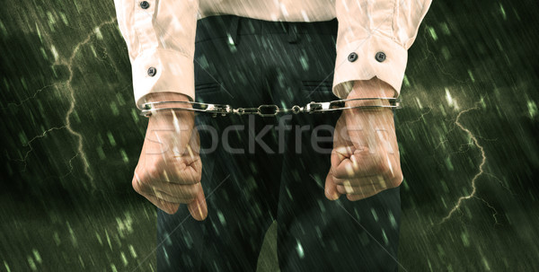 Stormy wallpaper with close handcuffed man Stock photo © ra2studio