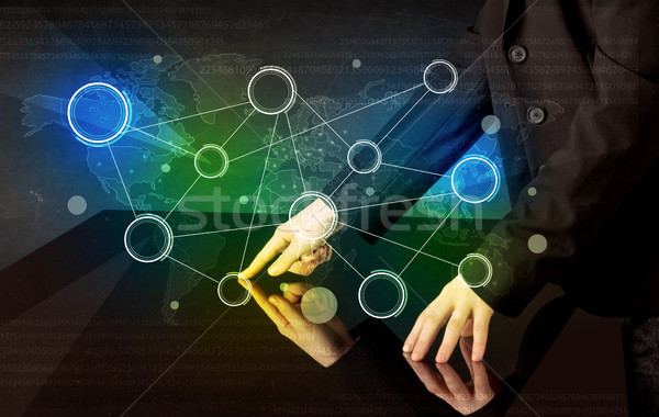 Ręce dotknąć interaktywny tabeli mężczyzna kolorowy Zdjęcia stock © ra2studio