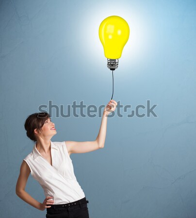 Knappe man gloeilamp ballon knap jonge man Stockfoto © ra2studio