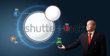 businessman in suit presenting abstract modern pie chart Stock photo © ra2studio
