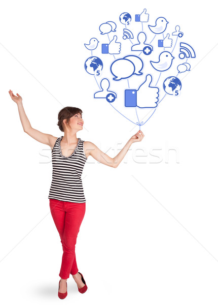 Stock photo: Happy lady holding social icon balloon