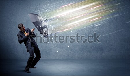 Worker with airbrush and colorful abstract clouds and balloons Stock photo © ra2studio