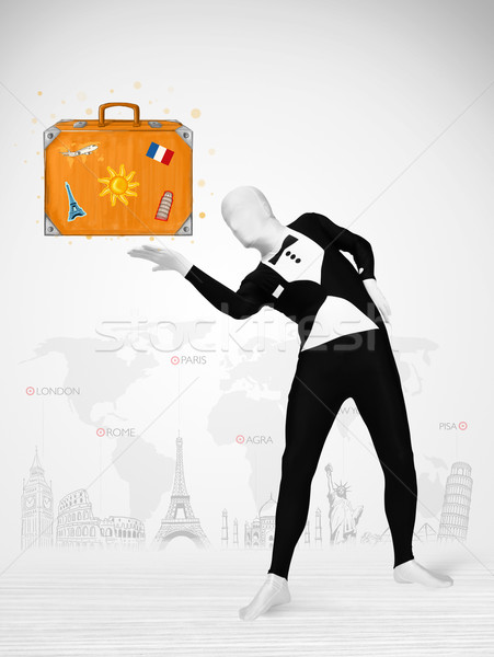 Férfi egészalakos öltöny bemutat vakáció bőrönd Stock fotó © ra2studio