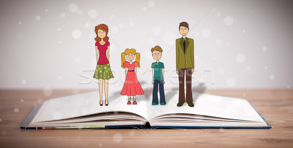 Drawing of a happy family on opened book Stock photo © ra2studio