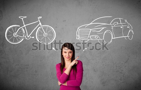 Woman making a choice between bicycle and car Stock photo © ra2studio