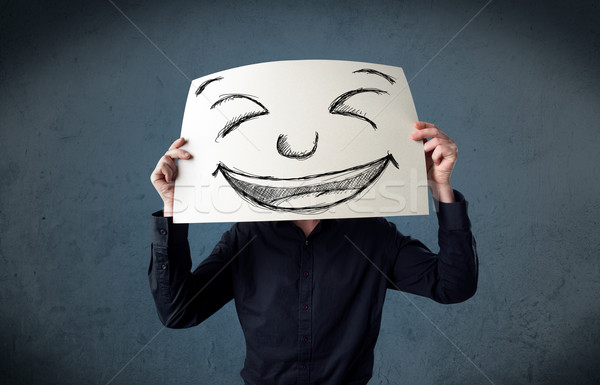 üzletember tart papír mosolygós arc kéz férfi Stock fotó © ra2studio