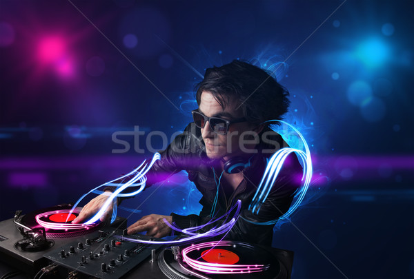 [[stock_photo]]: Disc-jockey · jouer · musique · effets · de · lumière · lumières · jeunes