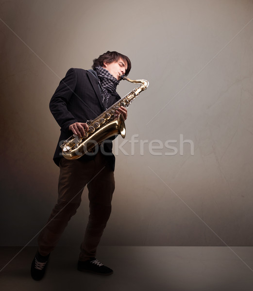 Jonge muzikant spelen saxofoon knap muziek Stockfoto © ra2studio