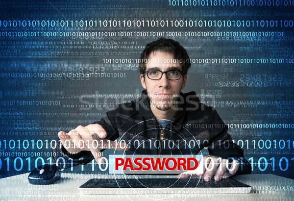 Young geek hacker stealing password  Stock photo © ra2studio