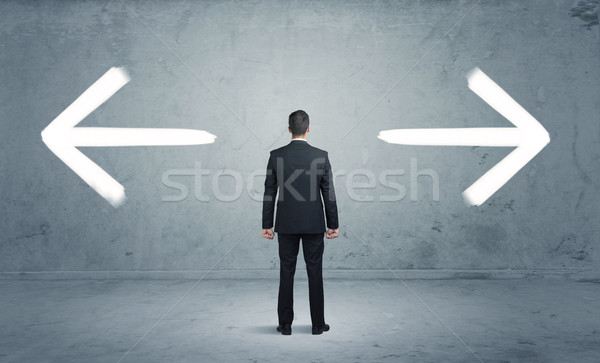 Confused business person choosing the way Stock photo © ra2studio