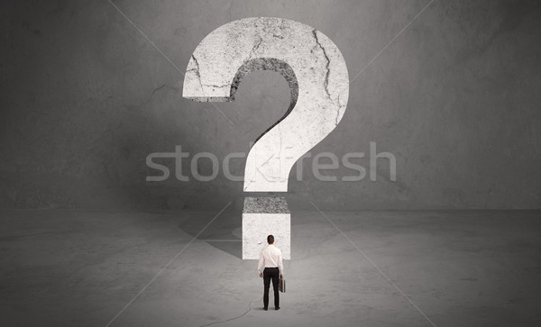 Confused businessman and big question mark Stock photo © ra2studio