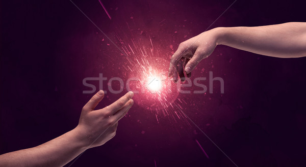 Touching hands light up sparkle in space Stock photo © ra2studio