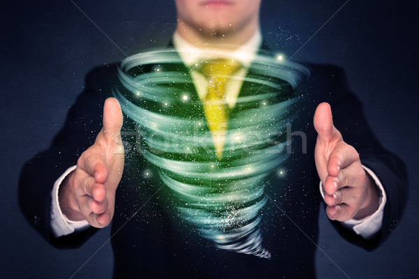 üzletember tart zöld tornádó fényes kezek Stock fotó © ra2studio