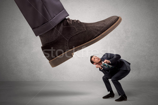 Employee afraid of the big boss foot Stock photo © ra2studio