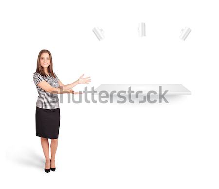 Beutiful young woman presenting modern copy space Stock photo © ra2studio