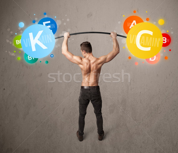 Foto stock: Muscular · homem · colorido · vitamina · pesos