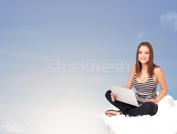 Young woman sitting on cloud with copy space Stock photo © ra2studio