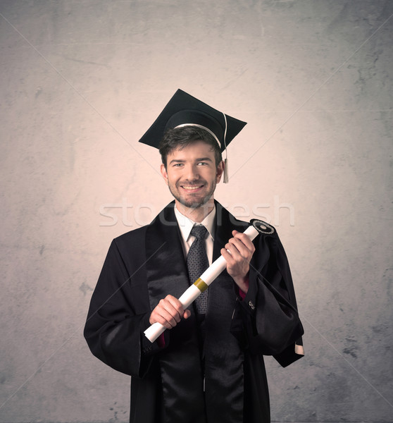 Portrait jeunes diplômé étudiant heureux [[stock_photo]] © ra2studio